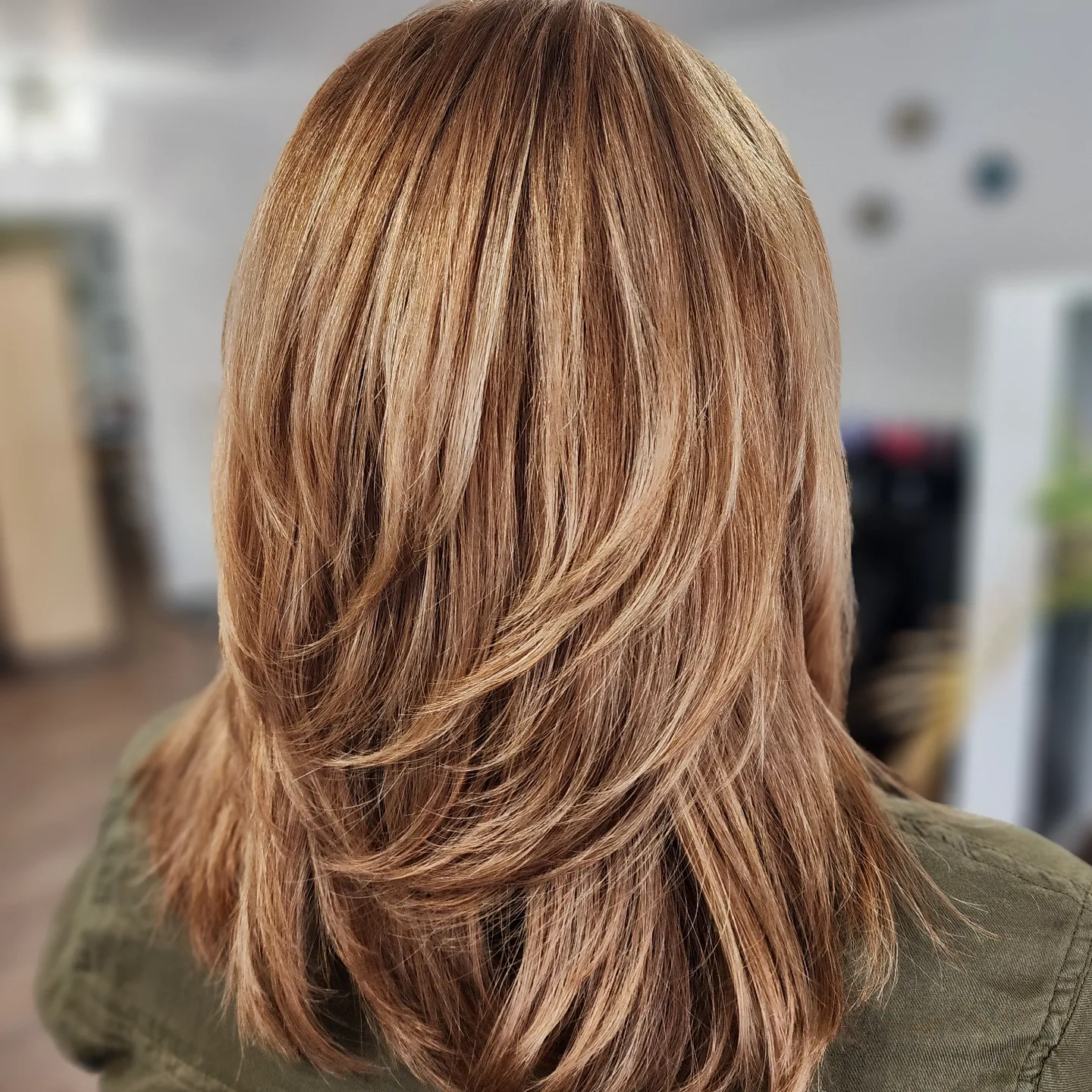 Warm copper highlights with layered blowout
